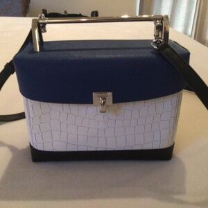 Fabulous rectangular bag by Botiker in blue, cream.  Removable shoulder strap.